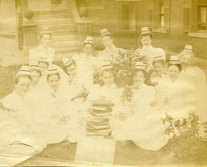 [Group of nurses on the lawn]