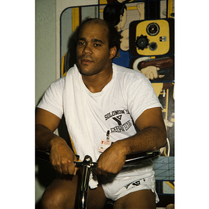 Man works out on an exercise bike