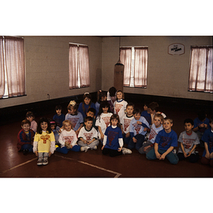 Children posing for a group photo at Eastern Middlesex Family YMCA