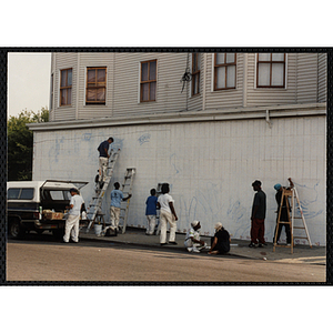 Ten young men and women from the Boys and Girls Clubs of Boston working on a mural project