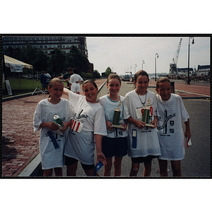 A group of girls pose for a shot at the Battle of Bunker Hill Road Race