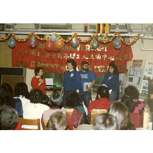 Suzanne Lee and others speaking at a Chinese Progressive Association event