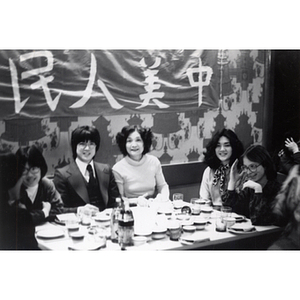 Members of the Chinese Progressive Association seated at a formal dinner