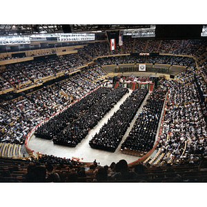 Aerial view of the graduates and audience from the morning commencement ceremony