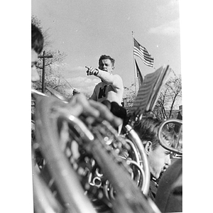 Student directing Northeastern University band