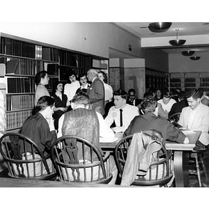 President Carl S. Ell talks to students at Dodge Library