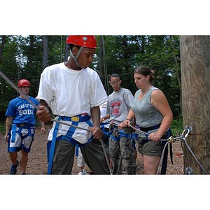 Michael Toney leads the group at the Torch Scholars Project Adventure Ropes Course