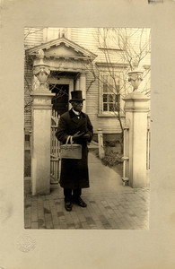 Caterer Edward Cassell standing in front of the Nichols House, Salem, Mass., ca. 1907