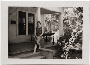 Marjorie Merrill on the front steps of the Freedom House