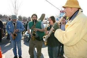 Saxophonists playing in the crowd: rally and march against the Iraq War