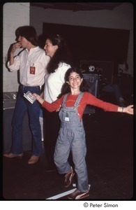 MUSE concert and rally: young girl making funny backstage at the MUSE concert, Jackson Browne in background