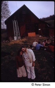 Couple in front of the barn, Tree Frog Farm commune