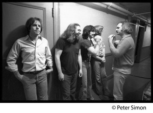 Grateful Dead backstage (left to right): Bob Weir, Jerry Garcia, Mickey Hart, Phil Lesh, and Bill Kreutzman