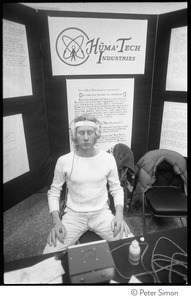 Demonstration of a biofeedback machine at the Huma-Tech Industries booth, Kohoutek Celebration of Consciousness