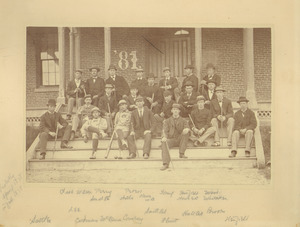 Class of 1881 sitting on the steps in front of North College