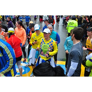 Woman running for Boston Children's Hospital stands at One Run finish line