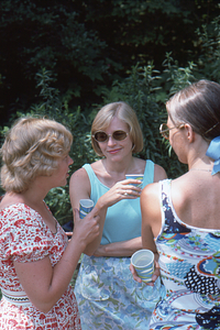 Pam Art, Bev Stevens, and Sandy Jorling (left to right) at Moon Barn Raising at entrance to Hopkins Forest on 2 August 1975.