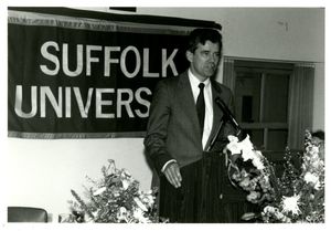 Athletics Director James E. Nelson speaking at Suffolk University's athletics banquet, 1993