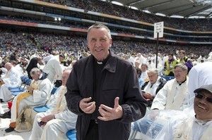 On the right in black, Canon Sean Rogan PP, Downpatrick, the priest who officiated at the funeral of Bobby Sands, PIRA hunger striker, at the 2012 50th Eucharistic Congress, Final Day Ceremony, 17th June, at Croke Park GAA Stadium, Dublin