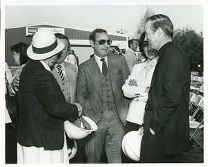 Robsham Theatre exterior: groundbreaking, J. Donald Monan speaking to group