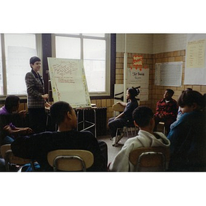 Woman facilitating a Teen and Kid Empowerment Program workshop.