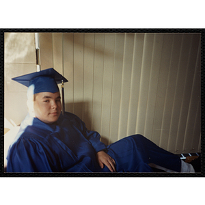 Matt Ezekeil poses during an Edwards School graduation ceremony