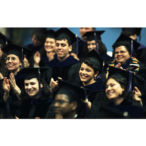 Graduates clapping at the 1997 School of Law commencement ceremony