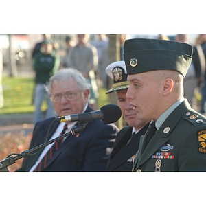 A uniformed man speaks at the Veterans Memorial dedication ceremony