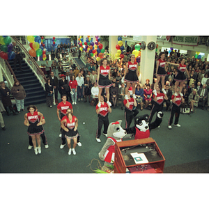 Northeastern University cheerleaders perform at the dedication of the Curry Student Center