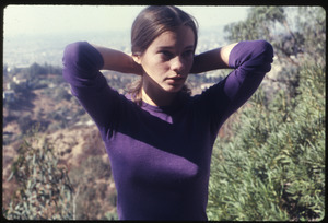 Woman in a purple sweater