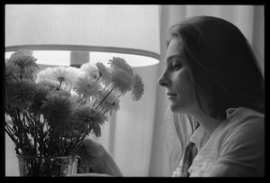 Judy Collins: portrait in profile with carnations