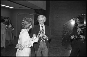 Andy Warhol mingling at a reception at the Birmingham Museum of Art