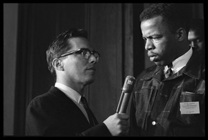 John Lewis interviewed by a reporter at the Youth, Non-Violence, and Social Change conference, Howard University