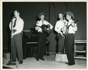 Jim Rooney (guitar), Fritz Richmond (bass), and Bill Keith (banjo), performing at the Whiting Milk Cerebral Palsy Square Dance