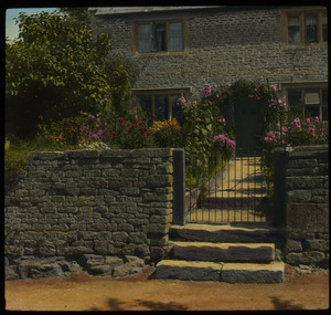 Gloucestershire Cottage (stone house with stone fence and flower garden)