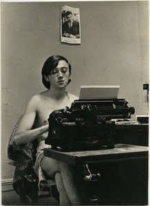 Raymond Mungo at typewriter