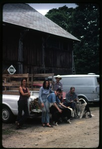 Joan Marr, Verandah Porche, Richard (seated), Tony Mathews, and Peter Natti (l. to r.) with dogs Schuman and Elsie, Montague Farm Commune