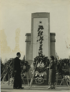 Shirley Graham Du Bois and a Chinese official at memorial to fallen soldiers