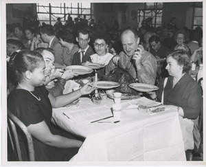 Clients enjoying dinner at Thanksgiving celebration