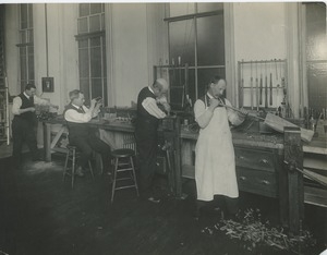 Men at work in the artificial limb shop