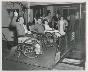 Wheelchair users wave