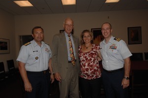 Congressman John W. Olver (2d from left) with Rear Adm. Gary Blore (left), and Commander Mark Fedor (right), US Coast Guard, Special Detailee to House Appropriations Committee