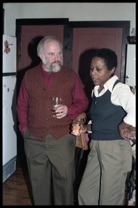 Robert H. Abel and Esther Terry, talking, drinks in hand, at the book party for Robert H. Abel