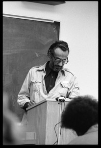 John A. Williams at the lectern