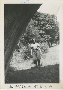 Bernice Kahn holding a bucket and net