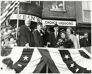Mayor John F. Collins, United States Representative John McCormack, Mary Collins, and children at a Saint Patrick's Day Parade