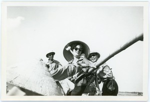 Woman practices with a large gun