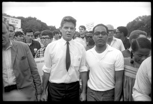 David Dellinger (partly out of view), Staughton Lynd, and Robert Parris Moses (left to right) at front of march: Assembly of Unrepresented People peace march on Washington