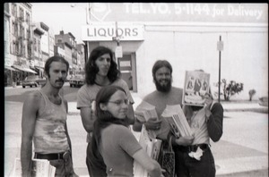 Crew distributing Free Spirit Press magazine: group of communards on a street corner, including Bill Grabin and Charlie Ribokas (center rear) and Kathy Murphy