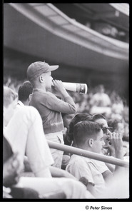 Mets at Shea Stadium: boy shouting through a rolled up program